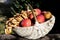 Traditional knit basket full of apples and pretzels