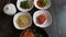 Traditional Korean Dish Bibimbap Served Along With Small Side Dishes Clled Banchan. Asian Authentic Cuisine