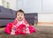 Traditional Korean dressing baby sitting on carpet