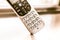 Traditional landline phone  on wooden desk background