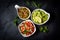 Traditional Latin American sauces Guacamole, Salsa, chili Pebre, slate background