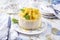 Traditional lemon cheesecake with lemon slices on design plate