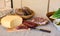 Traditional Lithuanian cuisine, table setting, homemade smoked sausage and side, cheese, bread