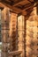 A traditional log hut with carved details. Rural wooden architecture, Russia, early autumn