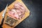 Traditional lunch meat with sliced cold cuts roast beef on a cutting board