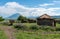 Traditional Maasai Village with Clay Round Huts in Engare Sero area near Lake Natron and Ol Doinyo Lengai volcano in