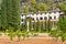 Traditional Majorcan rural manor house. View of the main facade and surrounding orchard