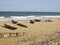 Traditional malagasy boat - canoe on african beach