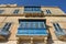 Traditional maltese building facade with all close blue balconies