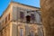 Traditional  Maltese house in Mdina Malta with Lamp  red shutters
