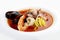 Traditional Marseille Bouillabaisse fish soup with prawns, mussels tomato,lobster, squid