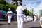 Traditional Marujada group dressed as sailors perform during the Fuzue parade