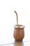 Traditional Mate caffeine-rich infused drink in a palo santo wood cup with a metal straw