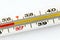 Traditional medicine thermometer with normal temperature 36.6 degrees.
