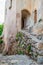 Traditional Medieval Buildings and Stone Alleys with Arches in Castle Town of Monsmvasia Island, Greece