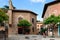 Traditional medieval square with citrus trees in Spanish village & x28;Poble Espanyol& x29; at Barcelona town, Catalonia, Spain