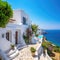 Traditional Mediterranean white house on hill with stunning sea view. Summer vacation background