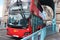 Traditional metropolitan transport in the capital on red double-decker buses in the Tower of London bridge on the Thames