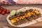 Traditional Middle eastern Persian chicken and lamb meat Shashlik Kebab skewered meat BBQ Grill on flat pita bread and saffron r