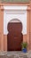 Traditional Moroccan ancient wooden entry door