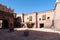 Traditional Moroccan courtyard with adobe buildings