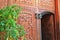 Traditional Moroccan decorative wooden door and bronze knockers