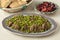 Traditional Moroccan dish with meat, peas, beet salad and bread