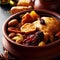 Traditional moroccan tajine of chicken with dried fruits and spices, selective focus