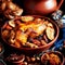 Traditional moroccan tajine of chicken with dried fruits and spices, selective focus