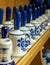 Traditional netherland`s porcelain ceramic white and blue handcrafted souvenir bells on shop`s display