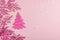 Traditional New Year composition in pink color tones. Festive decor, rosy Christmas tree branch