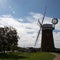 Traditional Norfolk windpump / windmill in shadow on a summer`s day