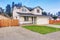 Traditional northwest home with driveway.