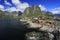 Traditional Norwegian red fishing cottages, huts, island HamnÃ¸y, Reine in Lofoten