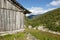 Traditional norwegian wooden farm and forest. Norway rural lands