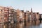 Traditional old buildings in Amsterdam, the Netherlands. Authentic canal houses in Amsterdam beautiful wallpaper.