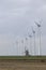 Traditional old dutch windmill goliath and wind turbines near eemshaven in the northern province groningen of the netherlands