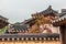 Traditional old korean building with tree and flowers