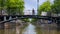 Traditional old narrow houses boats and canals Amsterdam, Netherlands, Europe, July 5 2023