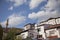 Traditional old ottoman village houses, mosque and blue sky