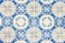 Traditional ornate Portuguese decorative color tiles azulejos in blue and yellow colors