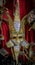 Traditional ornate Venetian carnival masks on display at a craftsman workshop studio and store in Venice, Italy