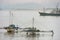 Traditional outrigger boats anchored at Labuan Bajo town on Flores Island, Nusa Tenggara, Indonesia