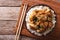 Traditional oyakodon and rice in a bowl. horizontal top view