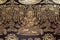 Traditional painting of ornate thai art golden motif four face of god floral pattern design background, graphic design