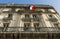 Traditional parisian house with balconies and exposed french fl