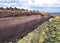 Traditional peat digging on the island of Whalsay in Shetland, UK