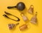 Traditional percussion instruments on yellow background