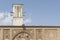 Traditional persian courtyard- Borujerdi house landmark windtower detail in front of blue sky