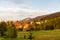 Traditional Polish highlander style houses in Krzeptowki, Zakopane, Tatra Mountains, during sunset